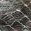 Thumbnail: Dark green and black bird netting weave strands