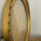 Miniature : Cadre en bois ovale doré avec verre bombé vintage vu de profil avec détails bombé et dorure 