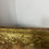 Miniature : Zoom sur la partie basse du cadre ancien bois et stuc doré