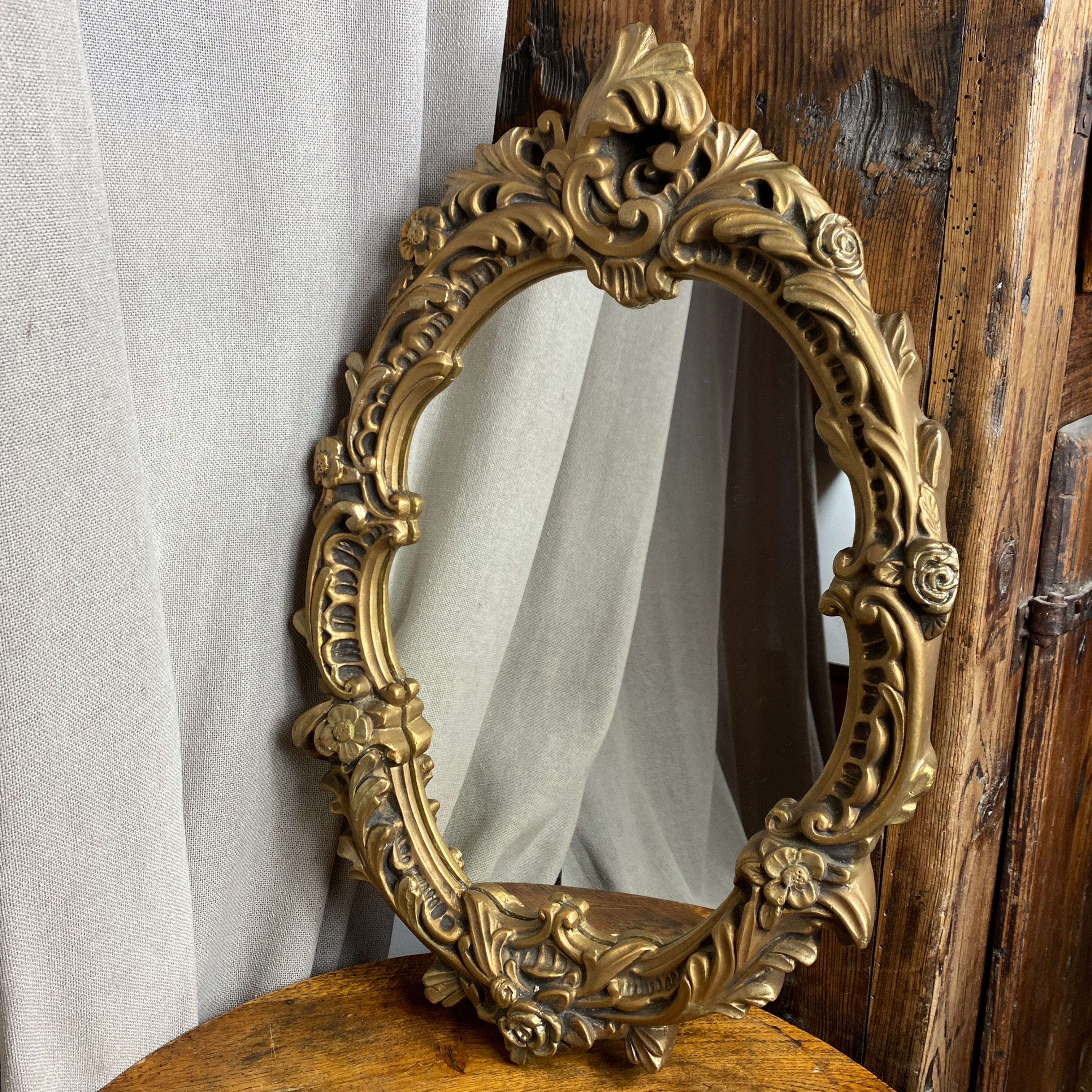 Miroir en bois et stuc rococo