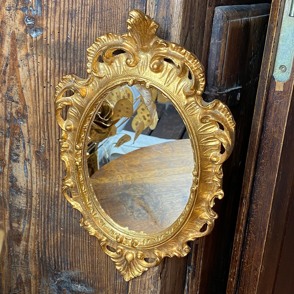 Miroir en bois florentin doré vintage