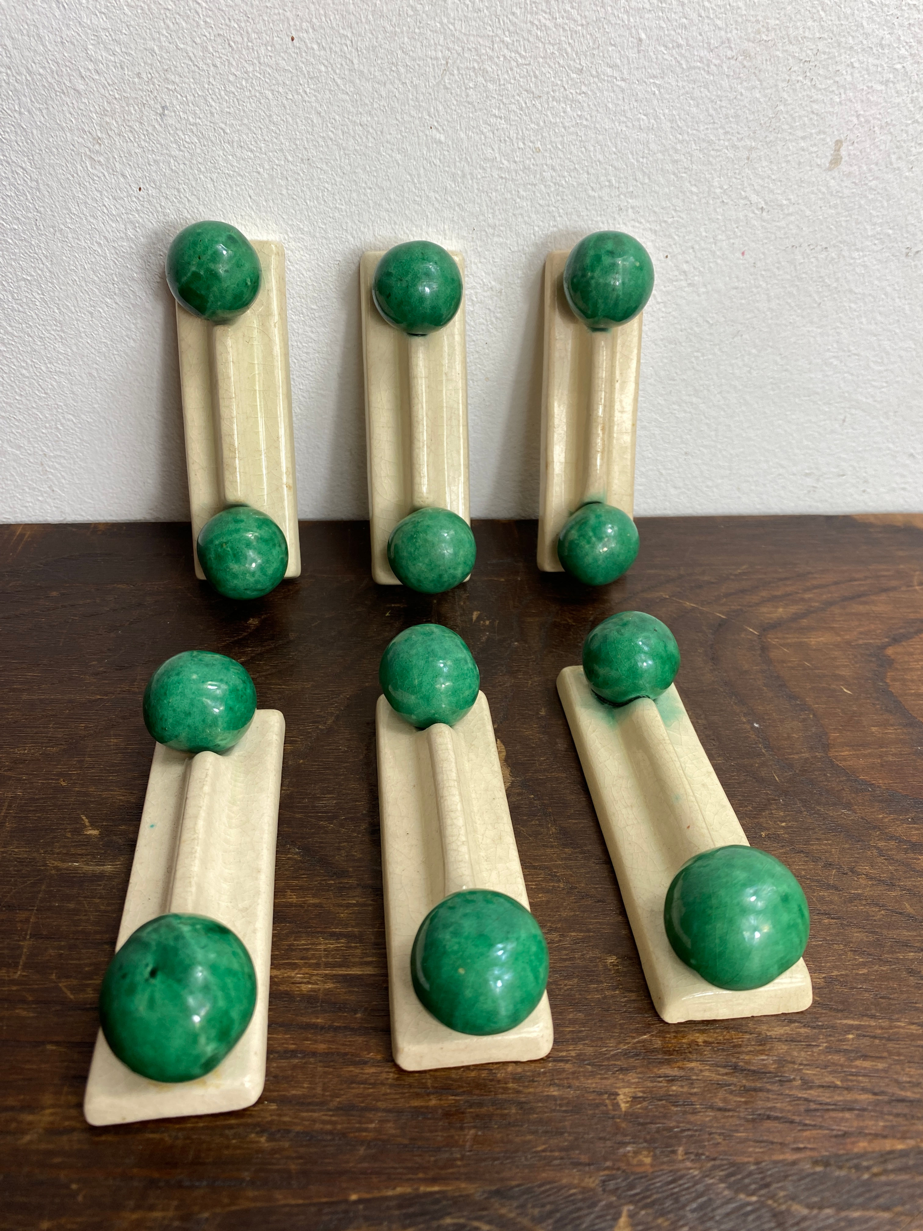 Six porte-couteaux en céramique Art Déco