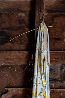 yellow - tablecloth - hay - farm - documentary photography - rural Americana - memory - West Virginia - 2022 - pandemic
