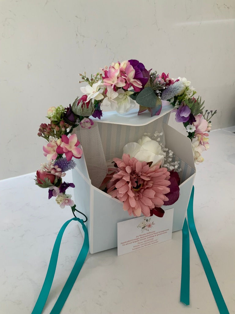 Thumbnail: Floral Fantasy Headband w/ colourful flower accents, foliage and satin accents