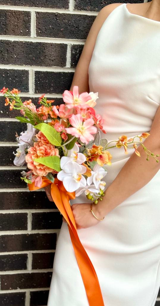 Thumbnail: Freeform Orange Symphony bridal bouquet 