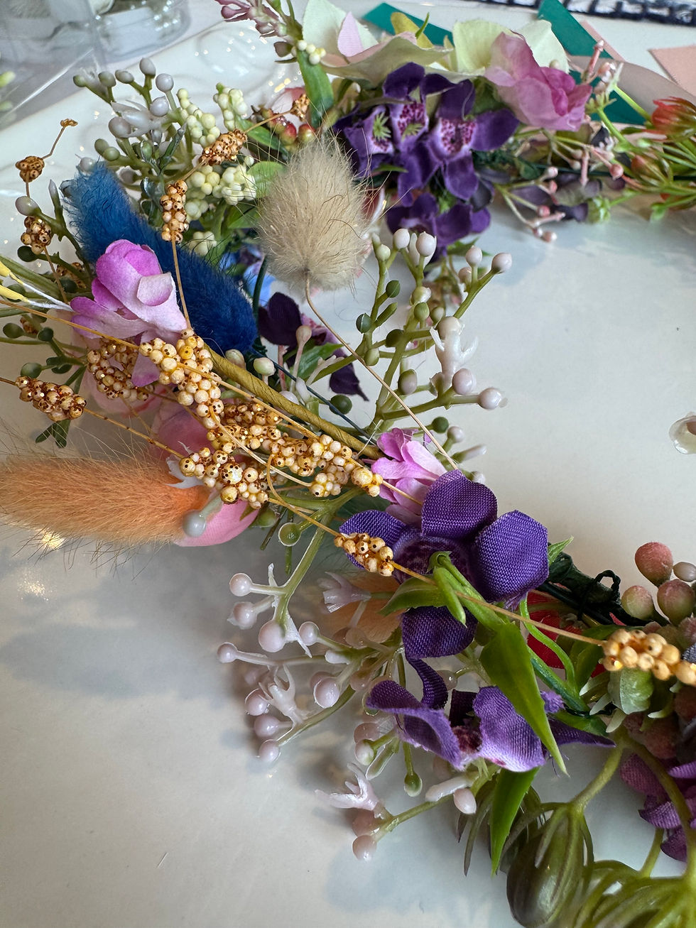 Close up shot of JW Weddings handmade Fairy rustic floral head garland purple daisy and bunny tail