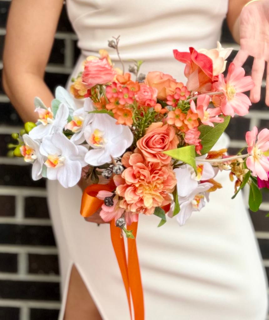 Thumbnail: Freeform Orange Symphony bridal bouquet 