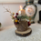Thumbnail: Real Australian wood Christmas stand on wooden base with crimson burgundy hydrangea, berries, and gold mini bauble