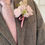 Thumbnail: Man in grey suit with pink tie wearing matching boutonniere with peonies, hydrangea and beige dried bunnytail