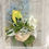 Thumbnail: Pastel yellow rose bud with powder pink and white flower petals & blue accents