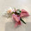 Thumbnail: Boutonniere with light pink peonies, dried accents, and pink silky satin bow