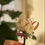 Thumbnail: White peony boutonniere w/ floral accents, light green & pink satin ribbon bows