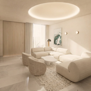 White washed living room with feature ceiling & designer furniture