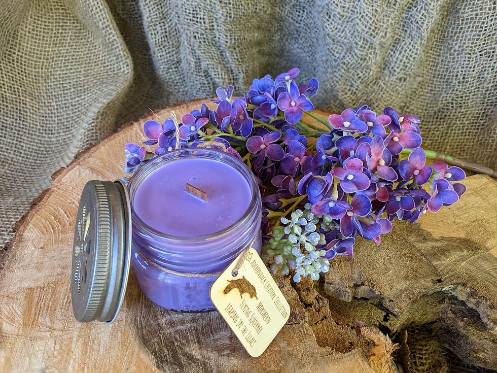 Thumbnail: rustic pure soy candle in squatty 4 ounce mason jar with a metal screw top and engraved wooden tag tied to jar with twine.