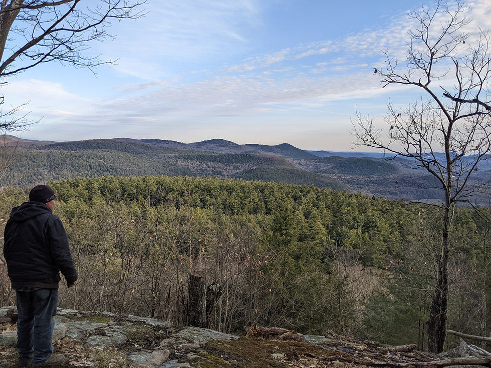 Gene overlooks a glorious view of the mountains.