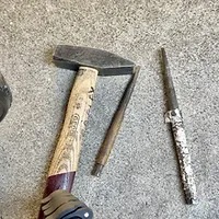 Hammer and drift pins used to DIY install Jeep Lift Kit.