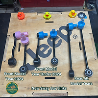 Longer sway bar links included in the DIY Mopar Bilstein lift kit, text and muddy ruttzz logo visible.  