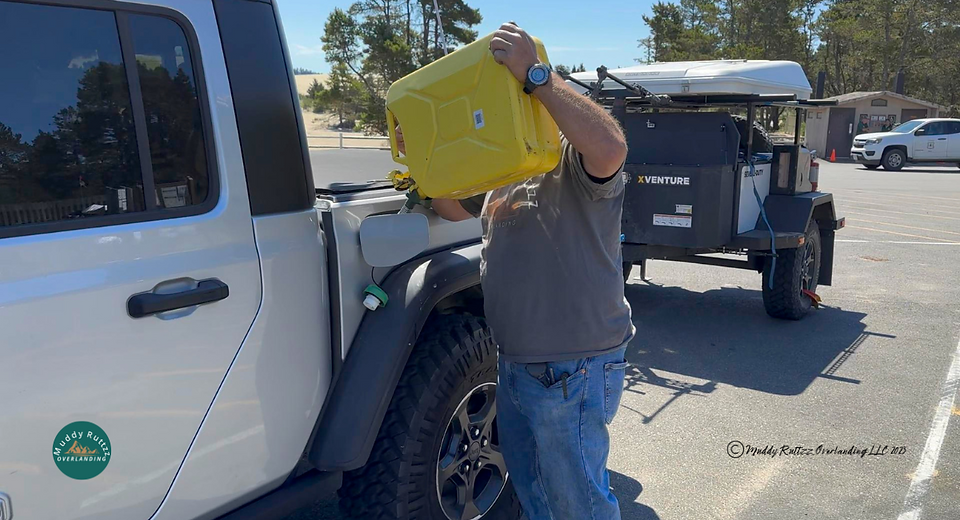 Dumping Diesel Into Jeep. Gerry can full of Diesel being dumped into fuel tank of Gladiator Ecodiesel.
