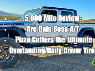Jeep Gladiator Rubicon Ecodiesel parked in the desert with text that says "5,000 Mile Review: Are Baja Boss A/T Pizza Cutters the Ultimate Overlanding/Daily Driver Tire?