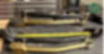 Adjustable control arms on a workbench, with two measurement methods shown: matching and tape measure. Text notes methods were inaccurate.