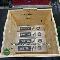 Bilstein Reservoir Shocks Boxed and in the Jeep Parts Crate, to be used in DIY lift kit install.