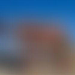 Large metal elaphant sculpture in Borrego Springs with Jeep & Exventure Trailer in the distance.