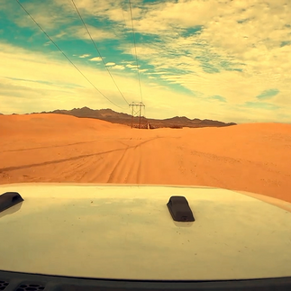 Rice Valley Dunes and power lines in the Rice Valley Wilderness Valley Dunes