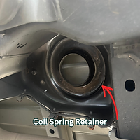 Coil spring retainer rear of Jeep Gladiator with stock spring removed to DIY install new Jeep lift kit.