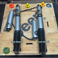 Bilstein reservoir shocks for front of Jeep Gladiator, parts for DIY Jeep lift kit install , text and muddy ruttzz logo visible.