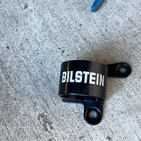 The Bilstein reservoir bracket for Jeep lift kit install, Gladiator Ecodiesel
