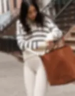 Woman carrying the Madewell Transport Tote 