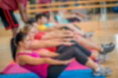 women taking a pilates class