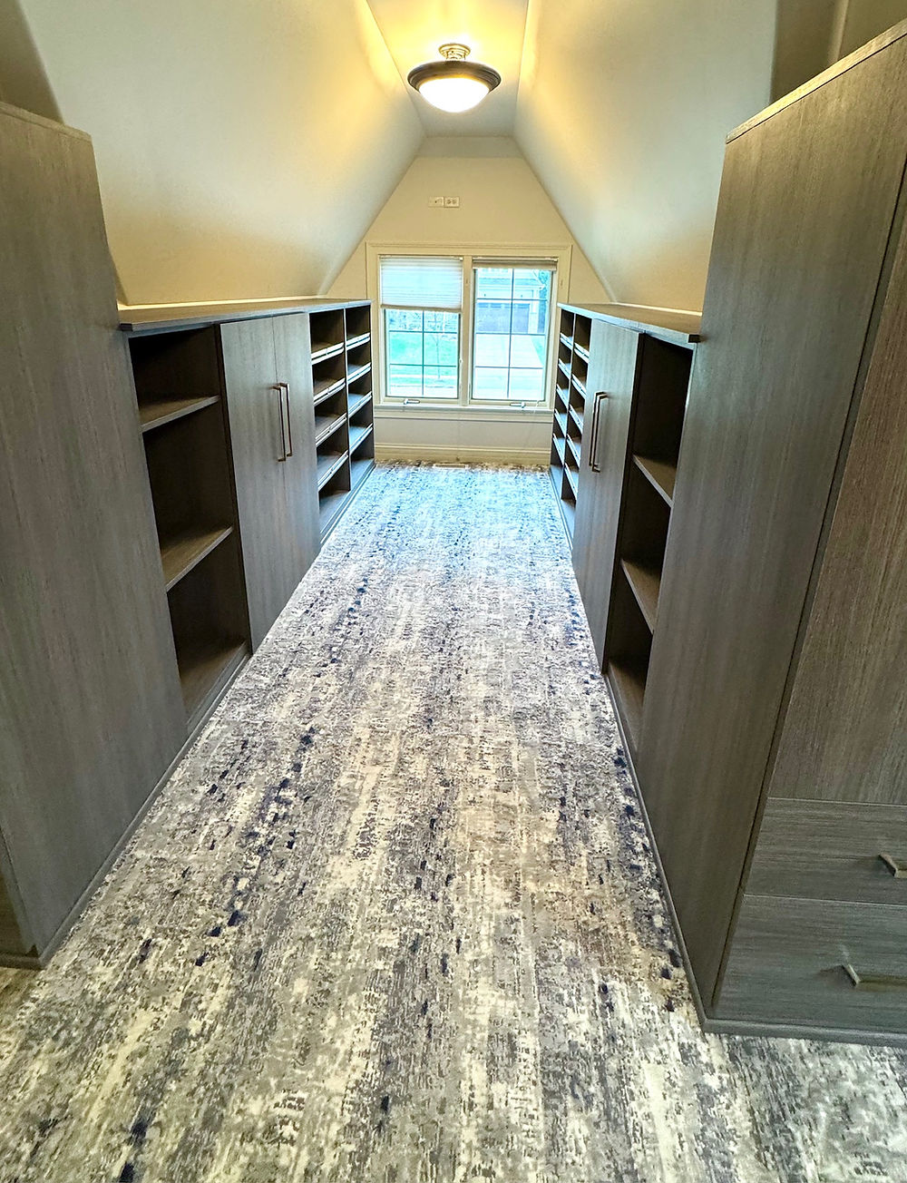 Custom attic closet with built-in shelving, design gallery