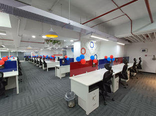 The office area designed with wood and glass finish