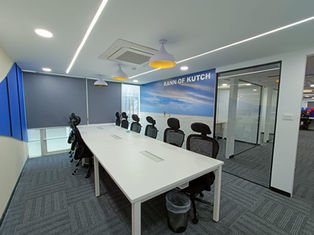 The office area designed with wood and glass finish