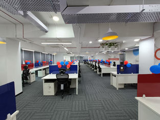The office area designed with wood and glass finish