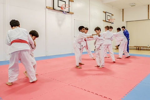 children practicing no-gi