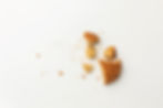 A crumbled cookie representing the fragile spreadsheet systems food brands rely on for cost tracking