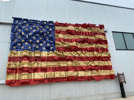 30’x18’ restoration/painting of American flag on top of existing wall relief