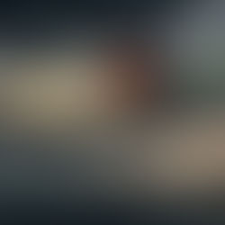 A dramatic, cinematic wide-shot illustration of the Four Horsemen of the Apocalypse galloping across a dark, stormy sky. The riders are on white, red, black, and pale green horses, leaving behind them trails of intense golden light and ethereal energy. Below the clouds, a hazy, realistic view of Earth’s continents is visible at twilight.