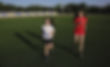 girls running on oval