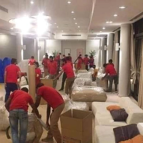 Imran Quick Movers professional team packing office and villa furniture in Dubai UAE