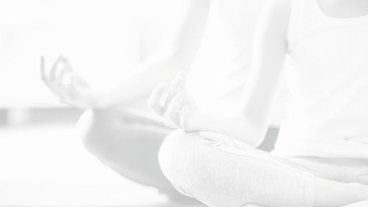 Someone doing breathwork and meditation