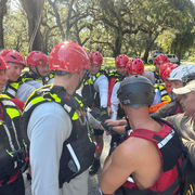 Rescue classmates huddled together for a motivational cheer