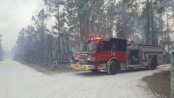 fire truck dirt road rural town