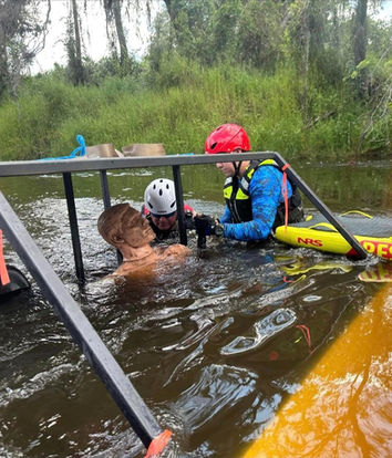 Submerged car prop in the river with human body prop inside to practice extrication