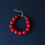 Miniatura: Bracelet de perles rouge Sam, argile polymère fait main et chaîne en laiton doré, ajustable, création Kadisha