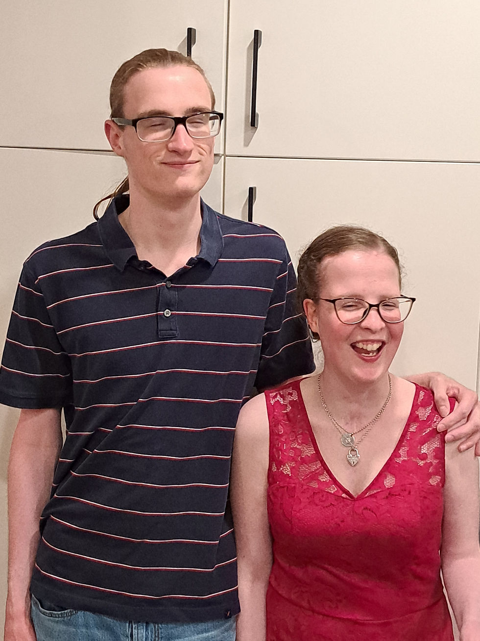 Twins Alex (left) and Aeva (right) as young adults, graduating out of Lansdowne Children's Centre support programs and services