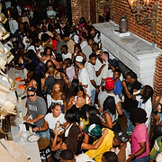 Lively launch event of Krave Cocktails in Washington, DC, featuring branded materials and guests enjoying the drinks, organiz