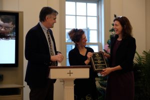 Sophie Wadsworth accepts the Climate For Freedom award from CCHRC co-chairs Rob Morrison and Ronni Olitsky